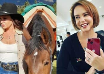 Natasha Klauss sonriendo frente al espejo